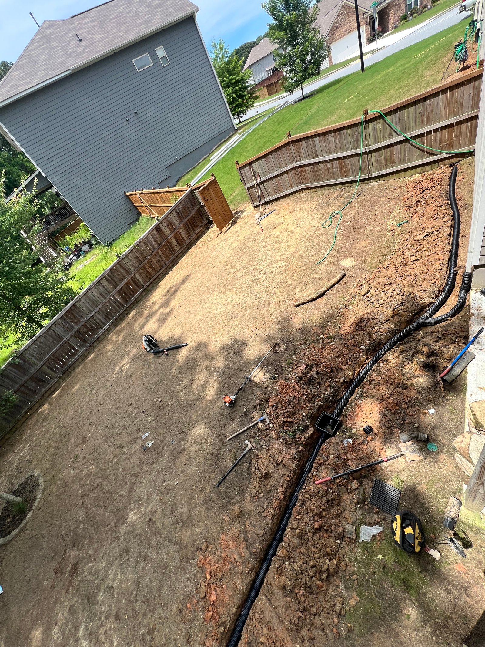 Luxury Retaining Wall & Steps Before in Vinings